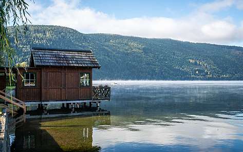Lakeside with wooden house