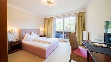 Bright hotel room with balcony